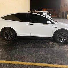White Tesla Model X after window tinting in Miami FL